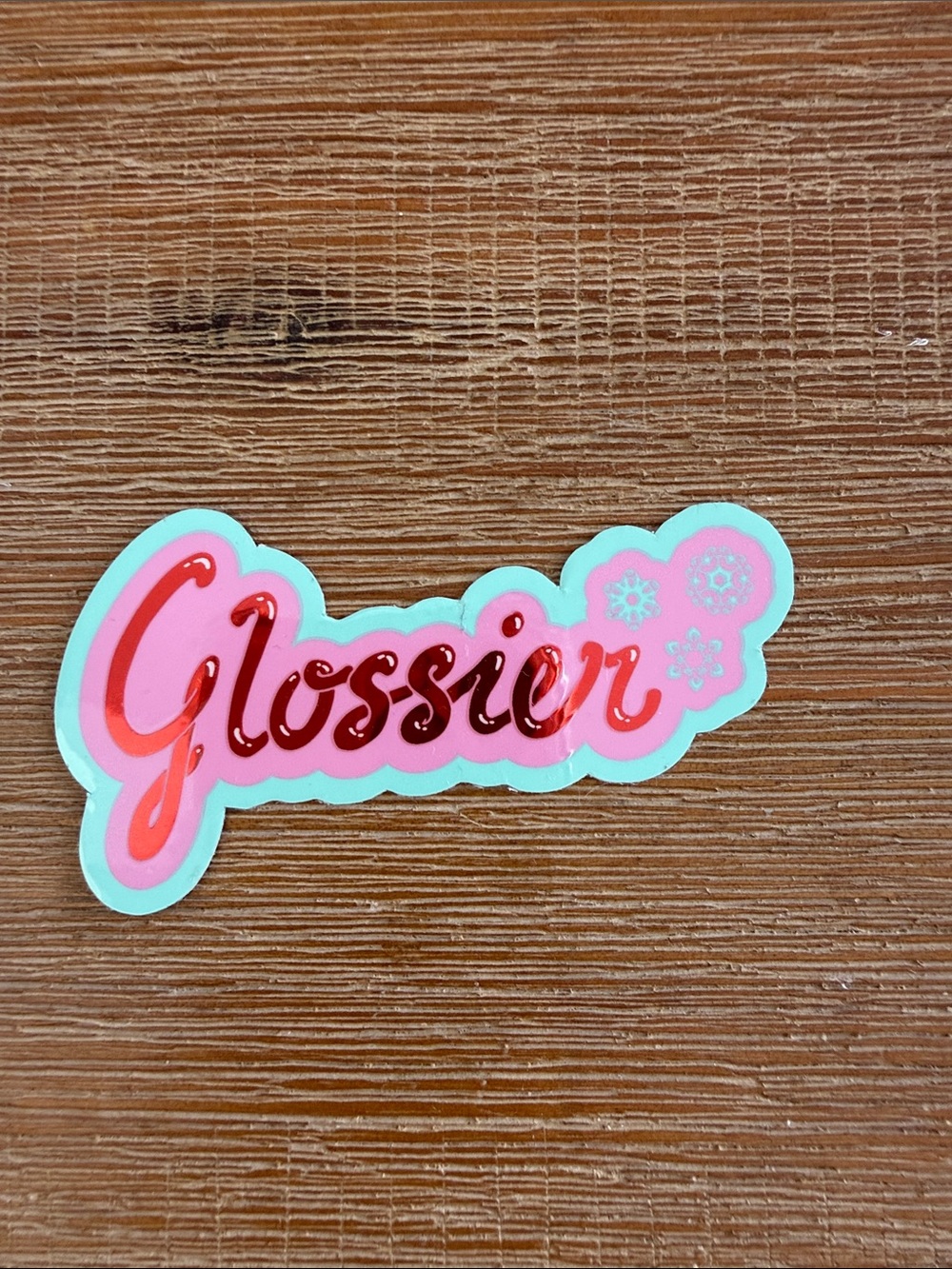 Glossier sticker